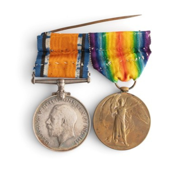 Two war medals with rainbow ribbons